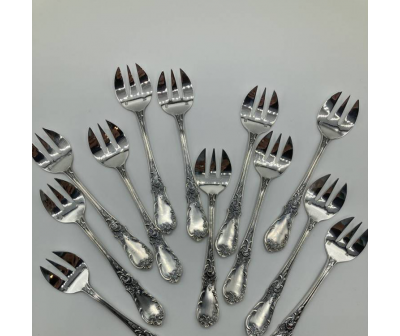 12 fourchettes à huitres en métal argenté